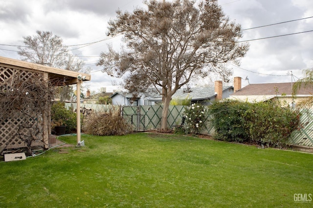 view of yard featuring fence