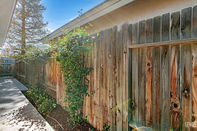 exterior details featuring fence