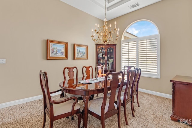 dining area featuring light carpet, plenty of natural light, visible vents, and baseboards