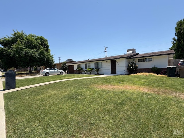 2801 Kaibab Ave, Bakersfield, CA 93306 - ranch-style home featuring a front yard and a chimney