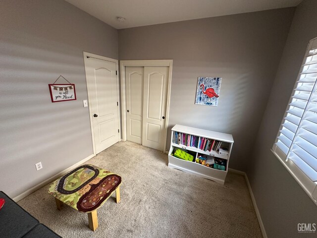 2114 Via Lazio Ave, Delano, CA 93215 - recreation room featuring carpet floors and baseboards