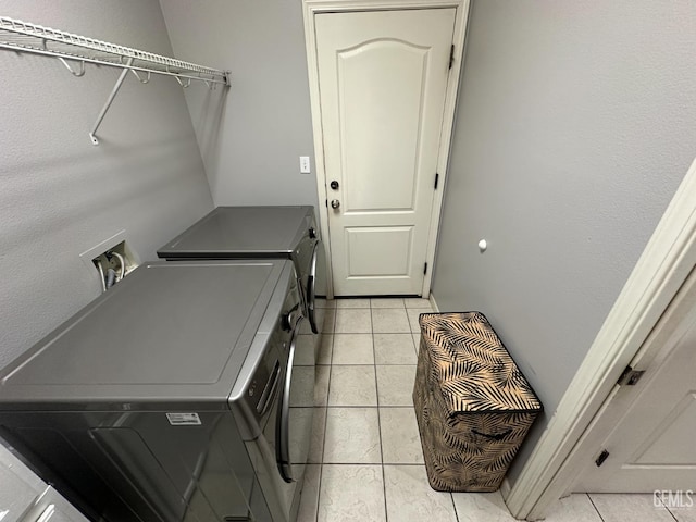 2114 Via Lazio Ave, Delano, CA 93215 - washroom with independent washer and dryer and light tile patterned floors