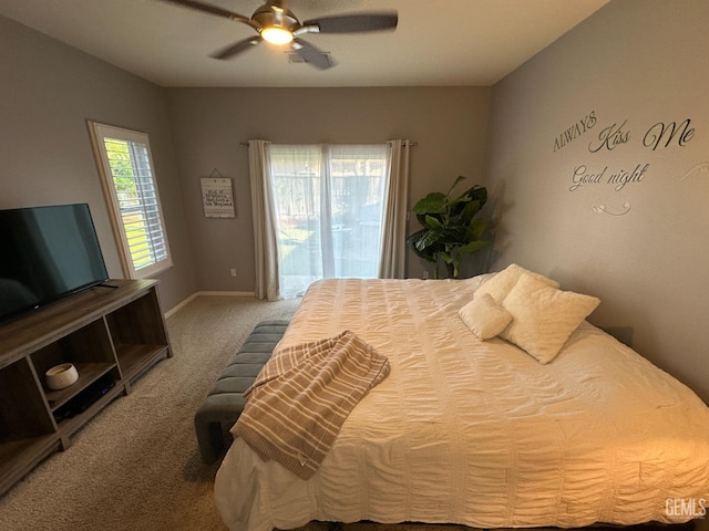 2114 Via Lazio Ave, Delano, CA 93215 - carpeted bedroom with access to exterior, a ceiling fan, and baseboards