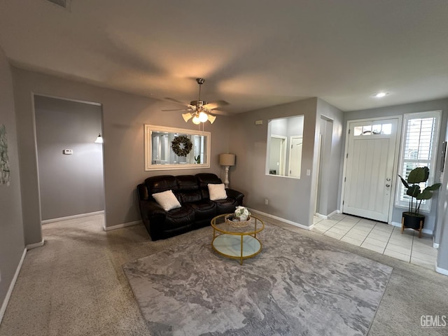 2114 Via Lazio Ave, Delano, CA 93215 - living room with baseboards, a ceiling fan, and carpet