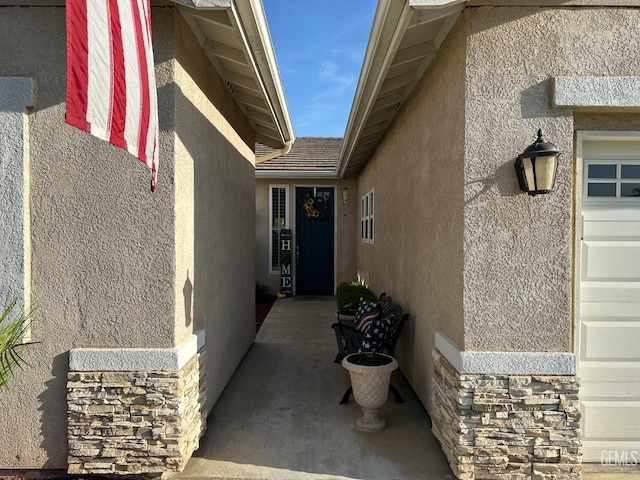 2114 Via Lazio Ave, Delano, CA 93215 - entrance to property featuring stucco siding and stone siding