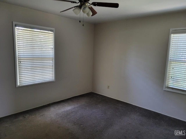 2915 Cedar St, Bakersfield, CA 93301 - empty room featuring a ceiling fan and dark carpet