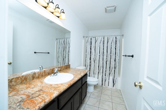 full bathroom with tile patterned floors, vanity, shower / bath combo, and toilet