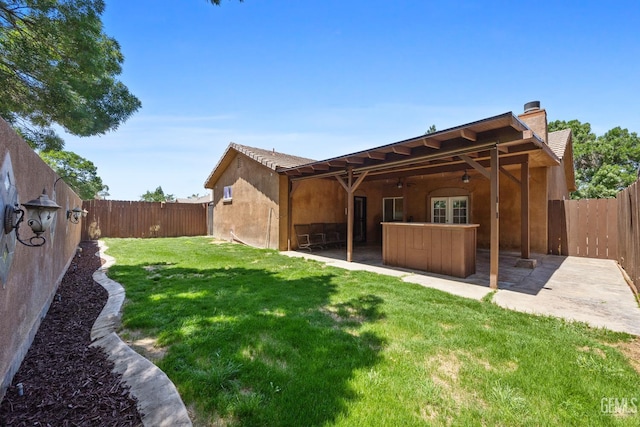 231 Sunny Meadow Dr, Bakersfield, CA 93308 - view of yard with a ceiling fan and a patio area