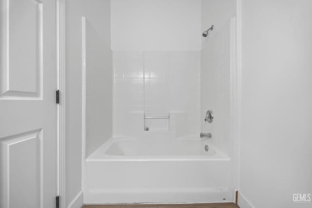 231 Sunny Meadow Dr, Bakersfield, CA 93308 - bathroom featuring baseboards and tub / shower combination
