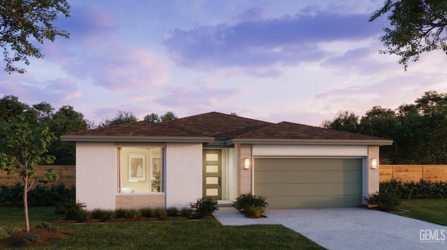 view of front of property with a garage, fence, concrete driveway, and stucco siding