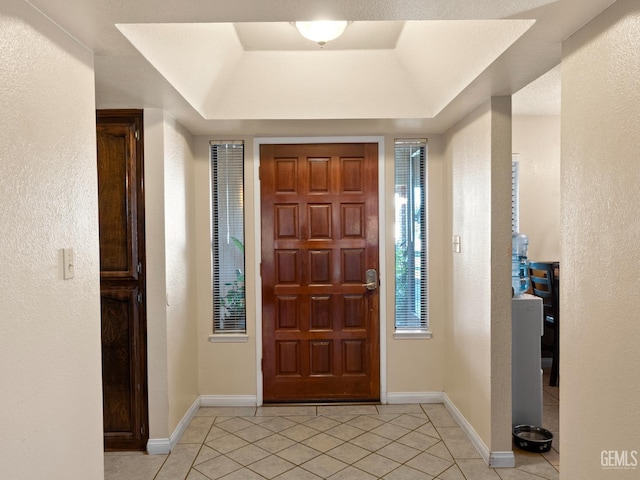 entrance foyer with light tile patterned floors