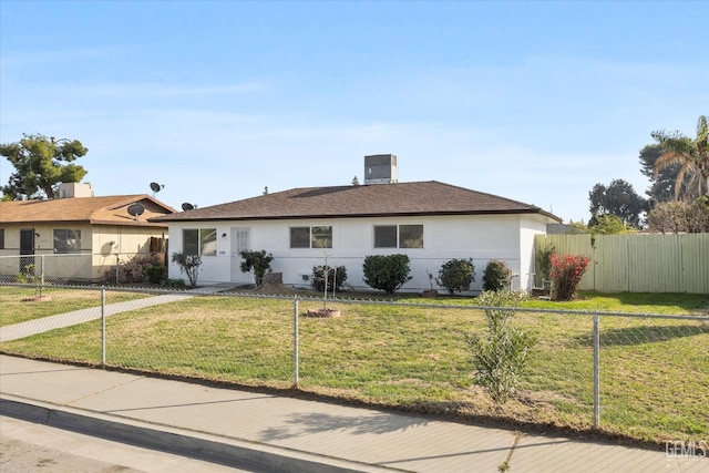 ranch-style house with a front lawn, fence, and stucco siding