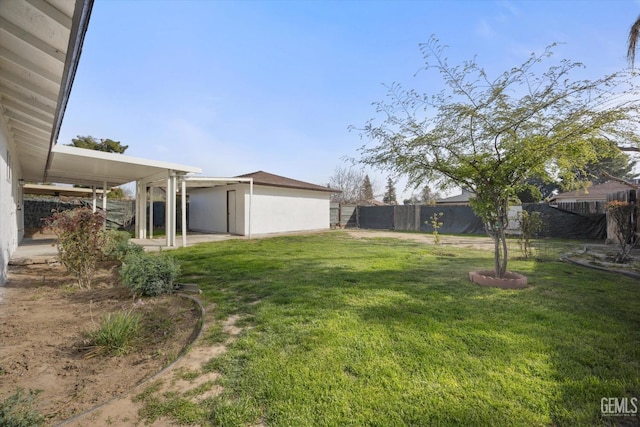 view of yard with a fenced backyard