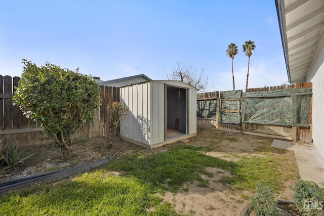 view of shed with a fenced backyard