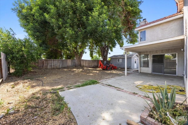 5821 Willowcrest St, Bakersfield, CA 93313 - fenced backyard with a patio
