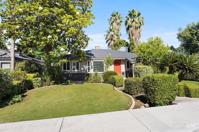 1701 Elm St, Bakersfield, CA 93301 - view of front of property with a front yard and stucco siding