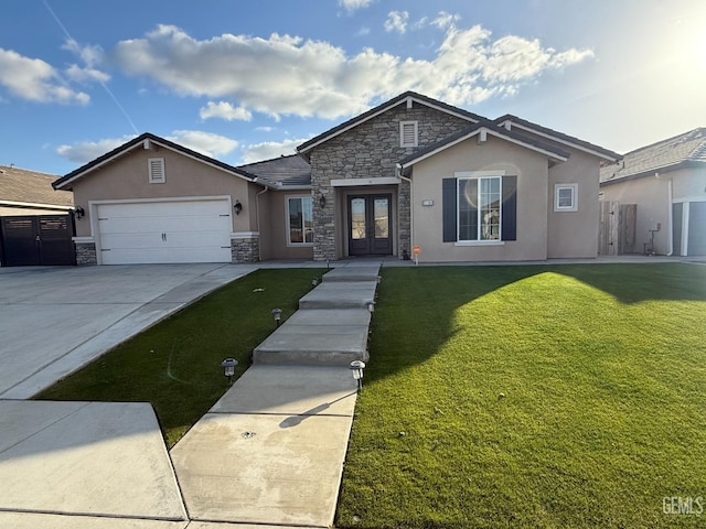 ranch-style house with a garage, stone siding, french doors, a front lawn, and stucco siding