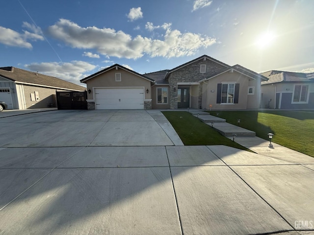 ranch-style home featuring a garage, stone siding, concrete driveway, stucco siding, and a front lawn