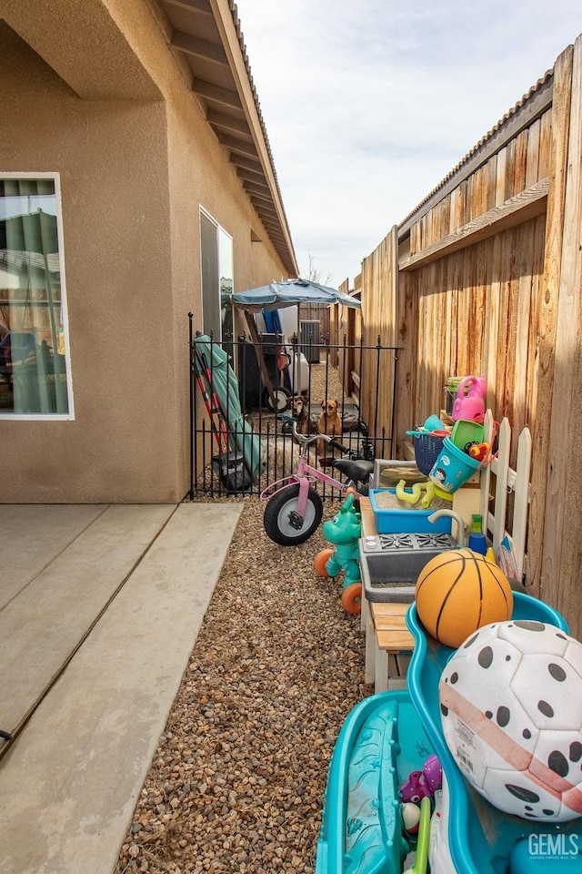 exterior space featuring a patio and fence