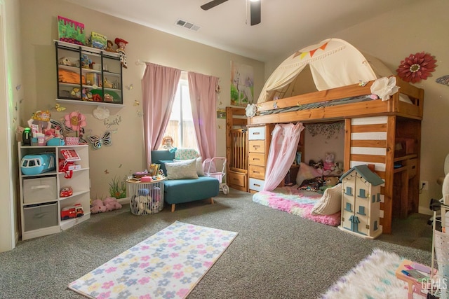 carpeted bedroom featuring a ceiling fan and visible vents