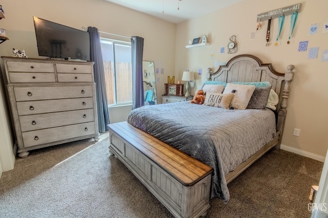 bedroom with baseboards and carpet flooring