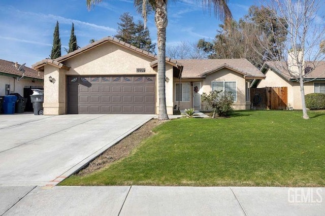 ranch-style home with a garage and a front yard