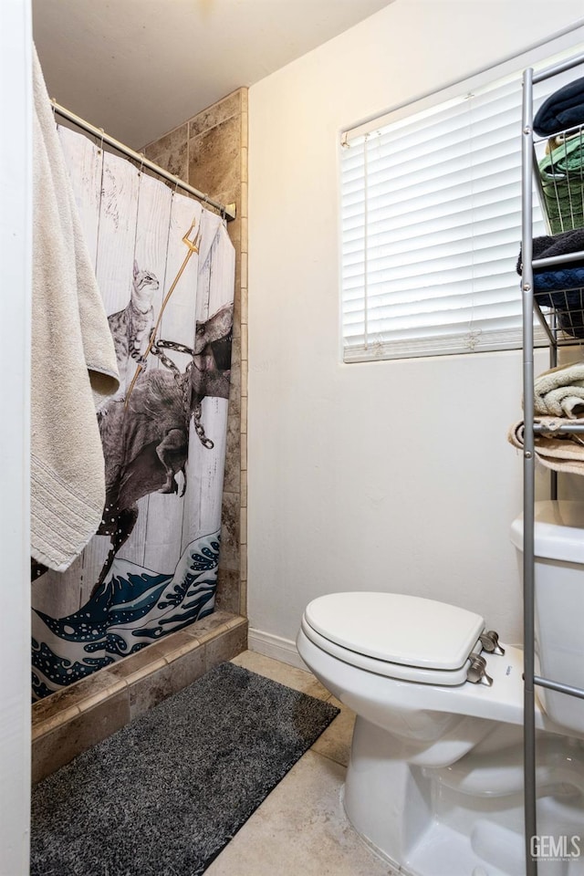 bathroom featuring concrete flooring, toilet, and walk in shower