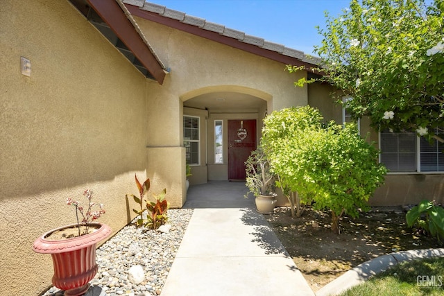 5702 San Pierre Ct, Bakersfield, CA 93308 - view of exterior entry featuring stucco siding