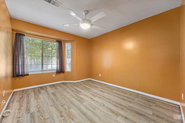 5702 San Pierre Ct, Bakersfield, CA 93308 - spare room with wood finished floors and ceiling fan