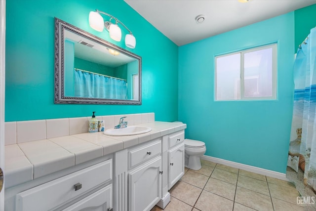 5702 San Pierre Ct, Bakersfield, CA 93308 - bathroom featuring vanity, tile patterned flooring, and curtained shower