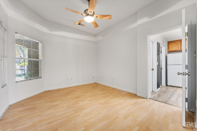 5702 San Pierre Ct, Bakersfield, CA 93308 - empty room featuring light wood-style flooring and ceiling fan