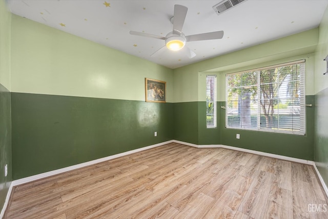 5702 San Pierre Ct, Bakersfield, CA 93308 - spare room with wood finished floors and ceiling fan