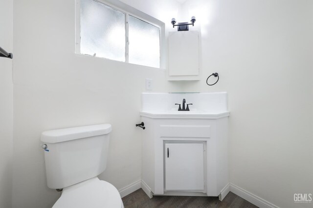 1312 Shattuck Ave, Bakersfield, CA 93305 - bathroom with vanity and wood finished floors