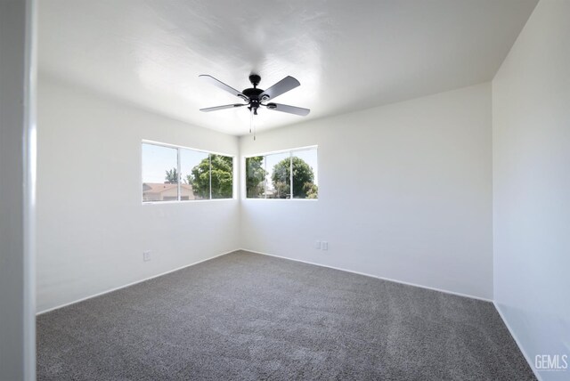 1312 Shattuck Ave, Bakersfield, CA 93305 - carpeted empty room with ceiling fan