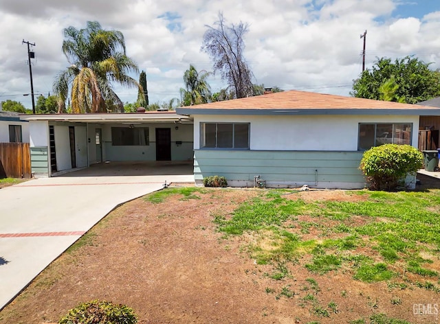 1312 Shattuck Ave, Bakersfield, CA 93305 - ranch-style home with a carport and driveway