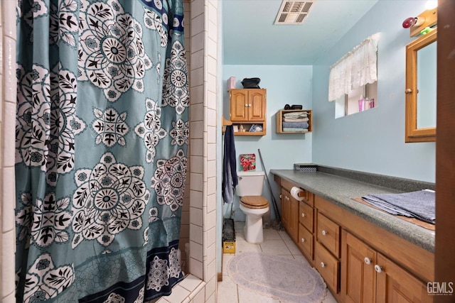 full bathroom featuring tile patterned flooring, vanity, toilet, curtained shower, and visible vents