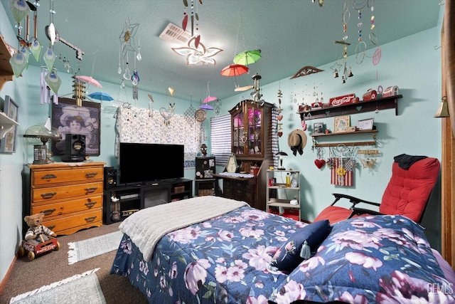 carpeted bedroom with visible vents