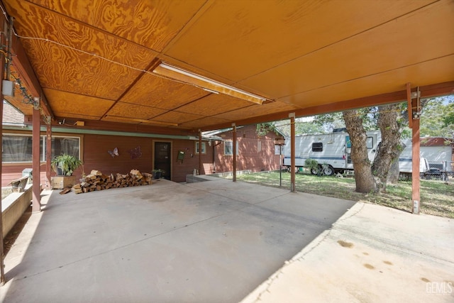 view of patio / terrace with an attached carport