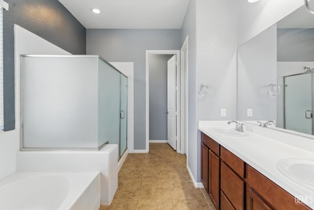 3420 Palagetto Pl, Bakersfield, CA 93314 - bathroom with a shower stall, a garden tub, double vanity, baseboards, and tile patterned flooring