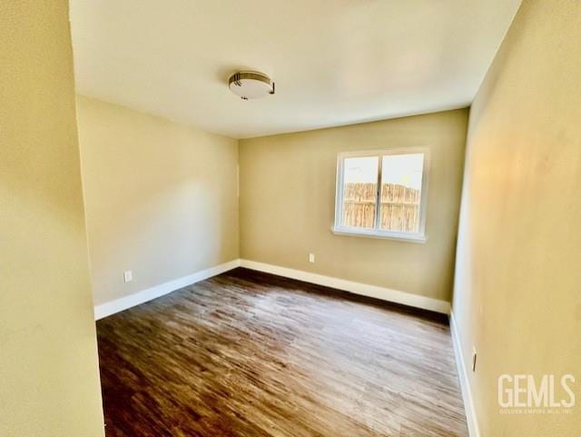 2004 Magdelena Ave, Bakersfield, CA 93307 - unfurnished room featuring wood finished floors and baseboards