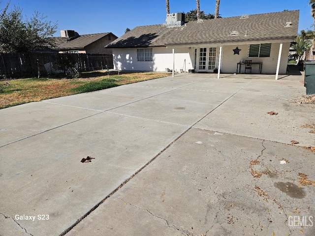 back of property featuring a patio area