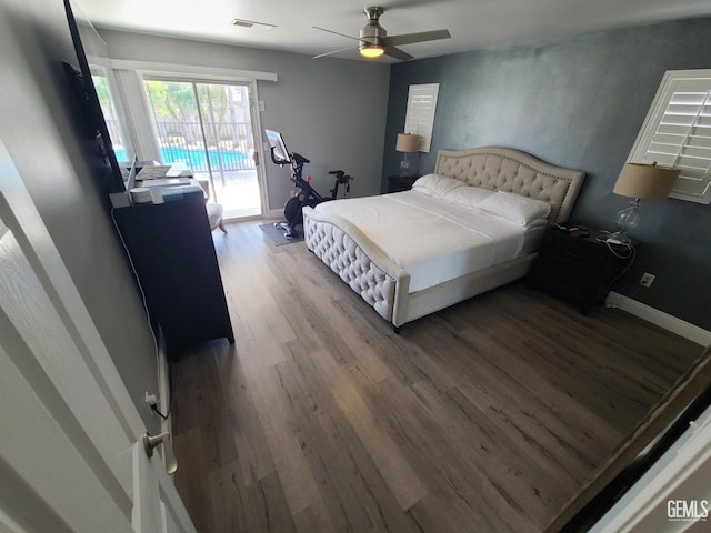 bedroom with baseboards, visible vents, ceiling fan, wood finished floors, and access to outside