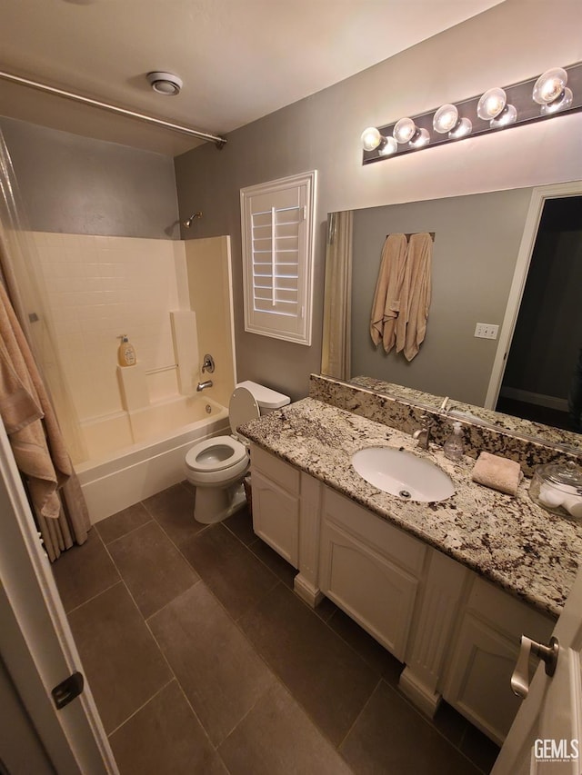 full bathroom featuring toilet, tile patterned flooring, shower / tub combo with curtain, and vanity