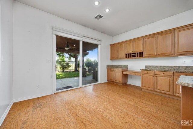 4702 Aviara Dr, Bakersfield, CA 93312 - kitchen featuring open shelves, light wood-type flooring, baseboards, recessed lighting, and brown cabinetry
