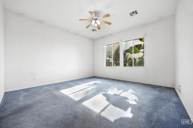 4702 Aviara Dr, Bakersfield, CA 93312 - empty room with carpet floors, a ceiling fan, and baseboards