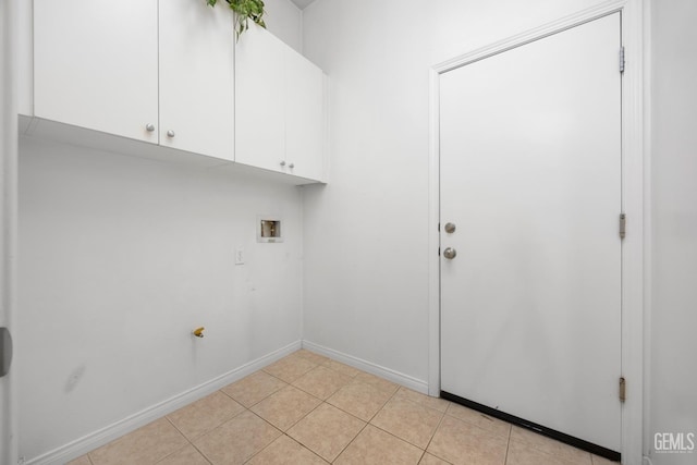 4702 Aviara Dr, Bakersfield, CA 93312 - laundry area featuring cabinet space, hookup for a washing machine, baseboards, and light tile patterned flooring