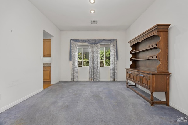 4702 Aviara Dr, Bakersfield, CA 93312 - unfurnished living room with carpet, baseboards, and recessed lighting