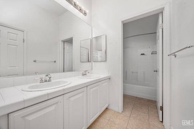 4702 Aviara Dr, Bakersfield, CA 93312 - bathroom featuring double vanity, tile patterned flooring,  shower combination, and baseboards