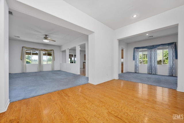 4702 Aviara Dr, Bakersfield, CA 93312 - carpeted spare room with a ceiling fan, recessed lighting, baseboards, and wood finished floors