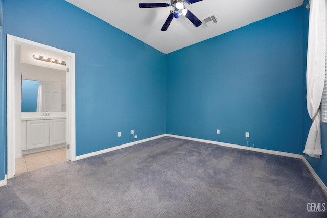 4702 Aviara Dr, Bakersfield, CA 93312 - spare room with carpet floors, ceiling fan, baseboards, and vaulted ceiling